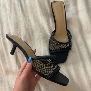 Fishnet kitten heels